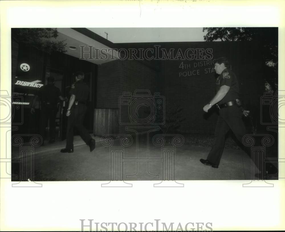 1993 Louisiana State Troopers enter Fourth District NOPD Station - Historic Images