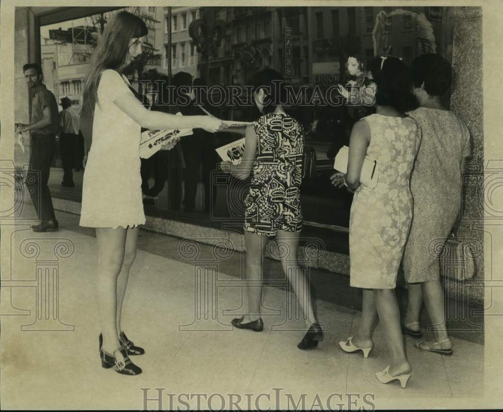 Terry Cohen handing out flyers - Historic Images