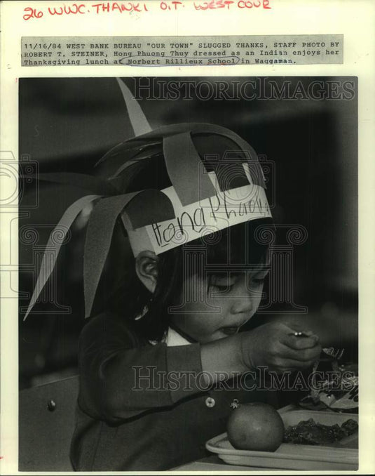 1984 Hong Thuy at Thanksgiving lunch at Louisiana Rillieux School - Historic Images