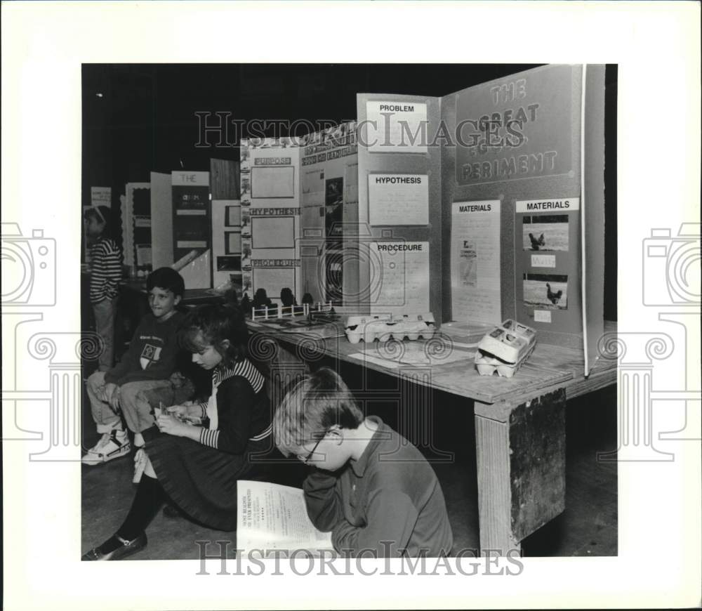 1991 Students Wait For Judge at Region 8 Science Fair in Hammond - Historic Images