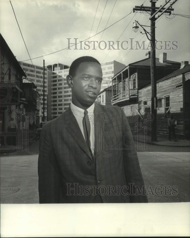 1967 Press Photo Xavier University graduate William Rouselle on Louisiana street - Historic Images