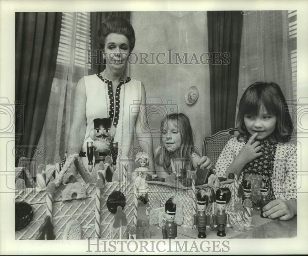 1976 Colleen Robinson with Gingerbread House - Historic Images