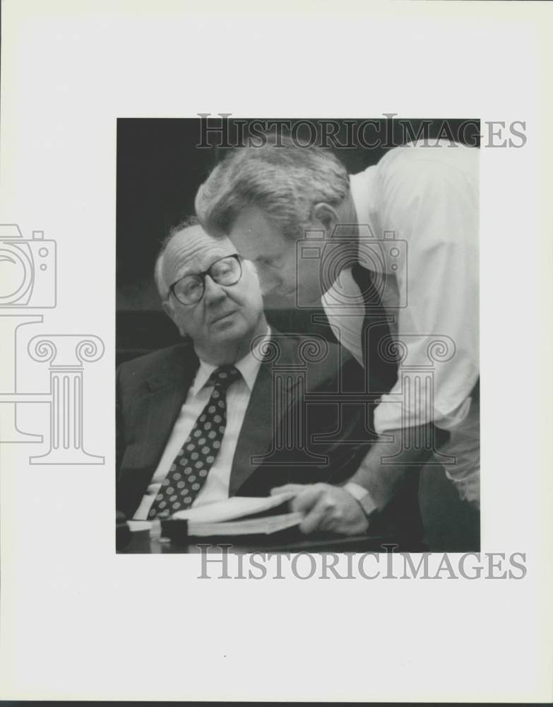 1992 Plaquemines Parish Pres. Luke Petrovich talks with Pat Marks - Historic Images