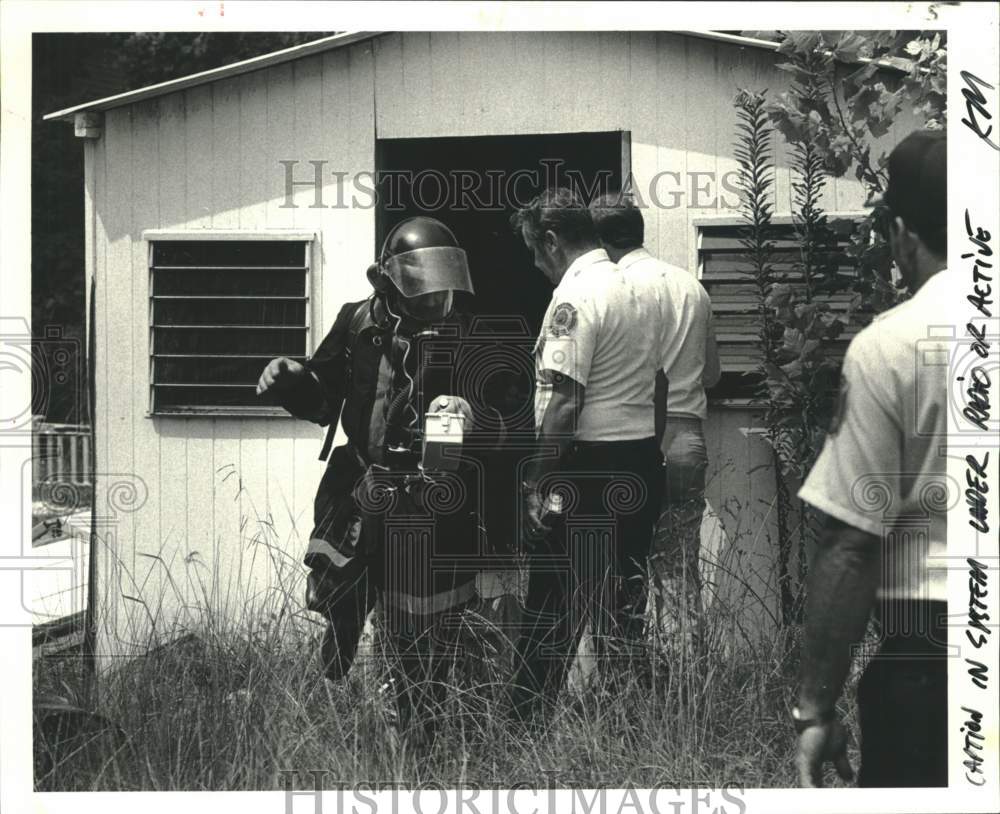 1982 Firefighters check for radiation in Chalmette, Louisiana - Historic Images