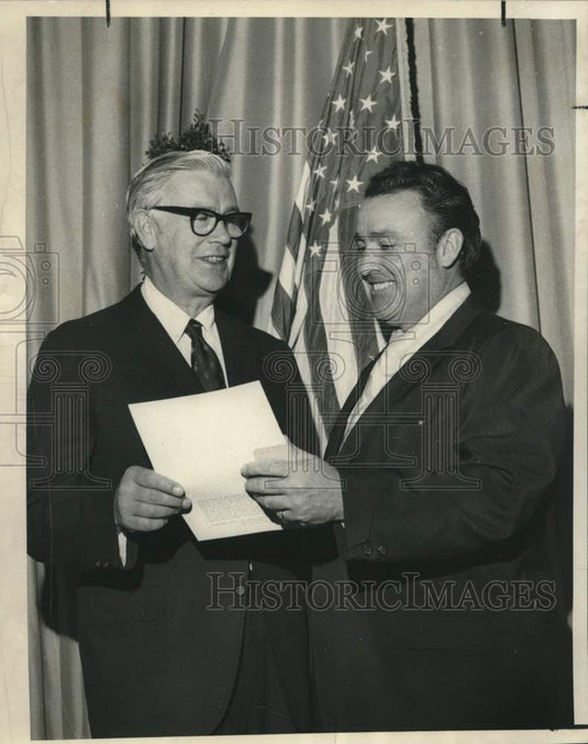 1971 Joseph Nee and John Cleutat chat at Fontainebleau Motor Hotel. - Historic Images