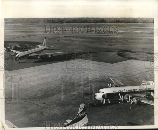1960 Propellar type plane after landing at airport-Historic Images
