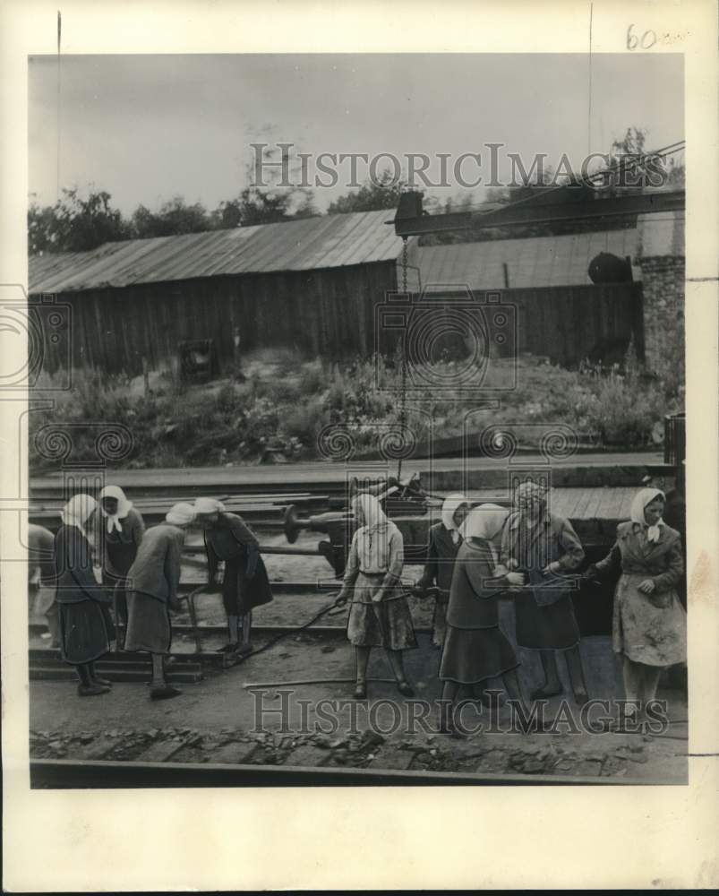 1953 Russian women work on railroad track-Historic Images