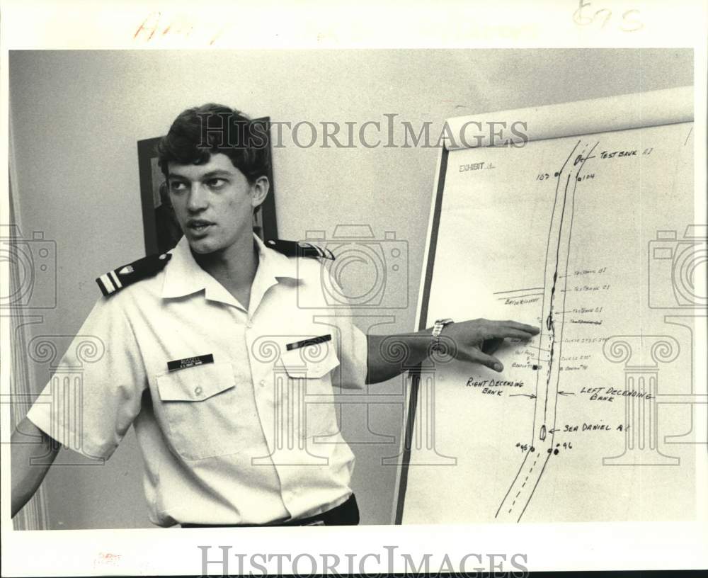 1980 Press Photo Coast Guard Lt. Burton S. Russell explains ships&#39; collision - Historic Images