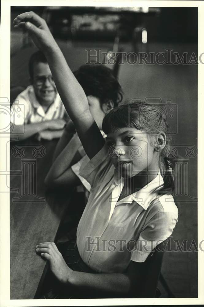 1986 Students during reading class at St. Peter School in Reserve - Historic Images