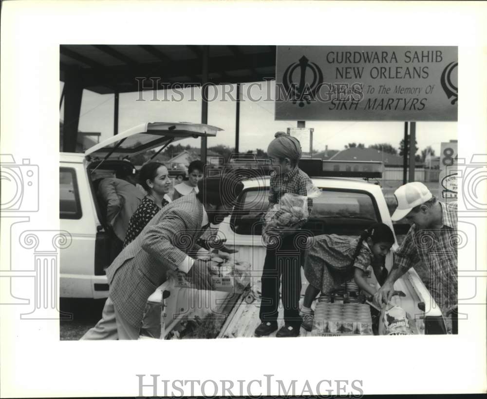 1989 Food giveaway at St. Philip Social Service Center - Historic Images