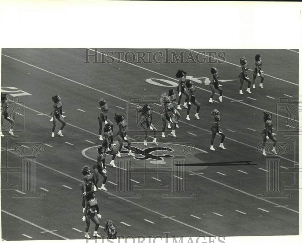 1985 St. Tammany Starlettes perform at football game. - Historic Images