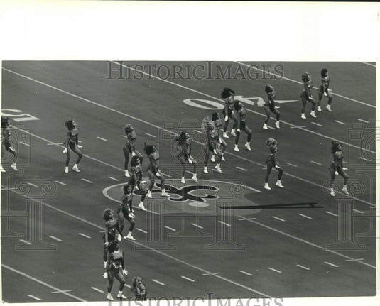 1985 St. Tammany Starlettes perform at football game. - Historic Images