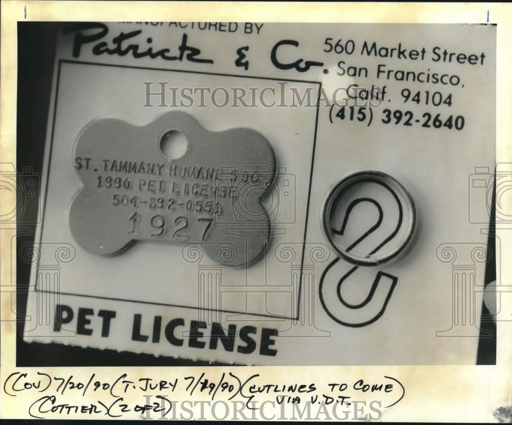 1990 Press Photo St. Tammany Humane Society 1990 pet license information. - Historic Images