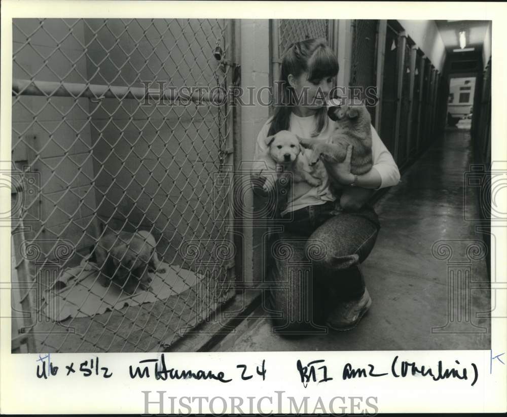 1989 St. Tammany Humane Society&#39;s Lynn Northup with adoptable pups - Historic Images