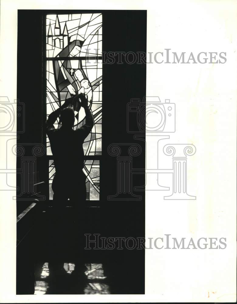 1986 St. Clement of Rome Parish window cleaned by Raymond Sanchez - Historic Images