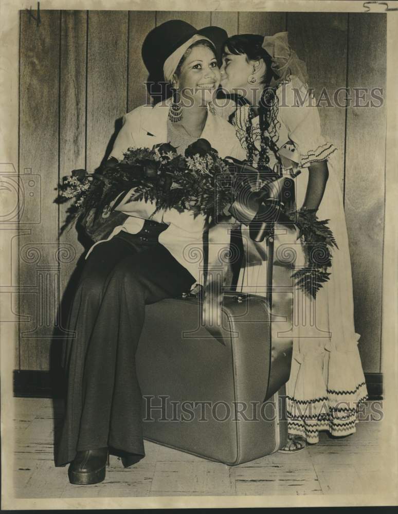 1972 Miss Frances Radillo presents bouquet to Miss Flavir Ramirez - Historic Images