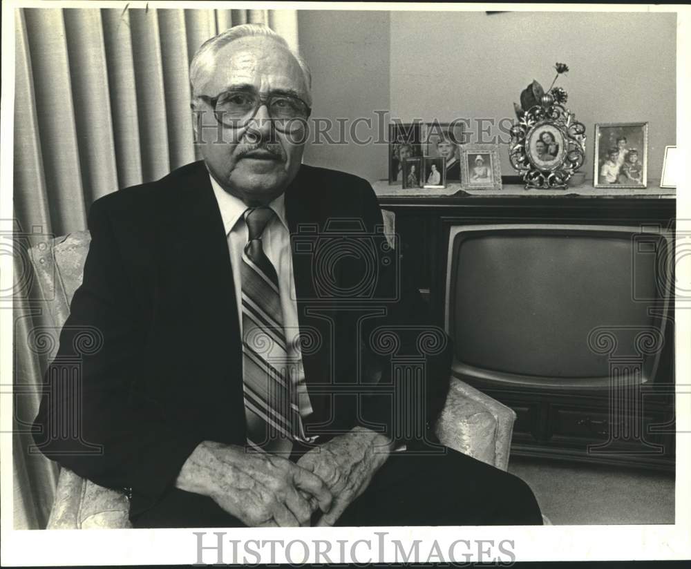 1984 Gaston J. Rabalais seated in his living room in Metairie - Historic Images