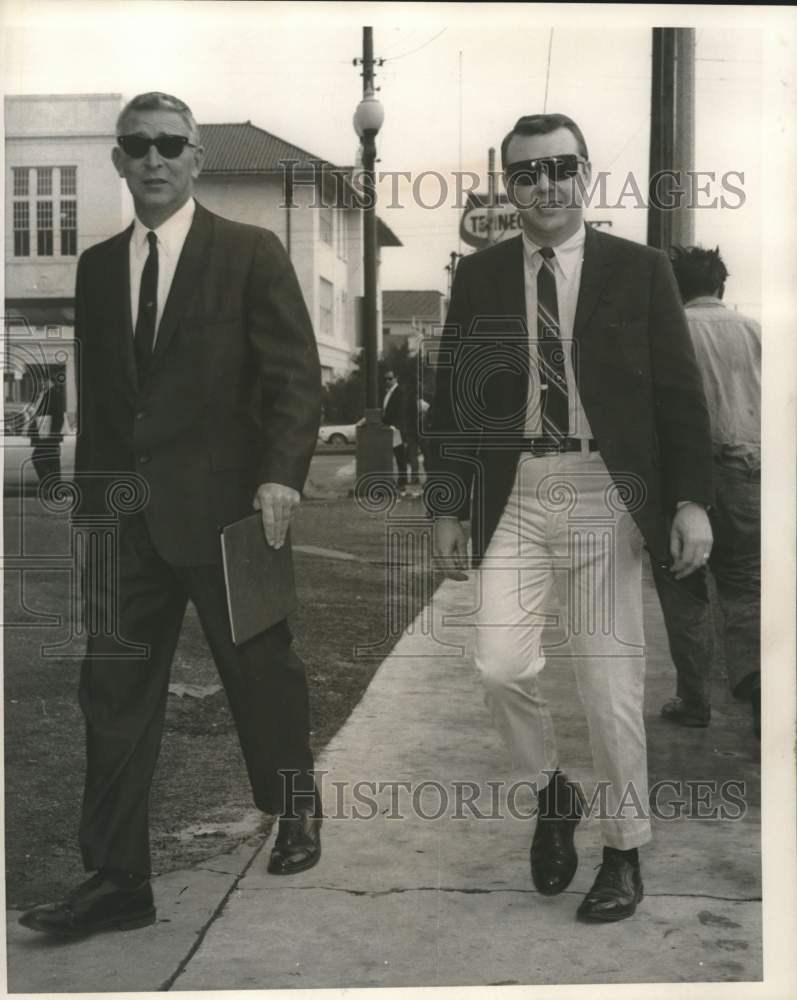 1968 Television announcers Bill Reed and Bob Jones walking - Historic Images