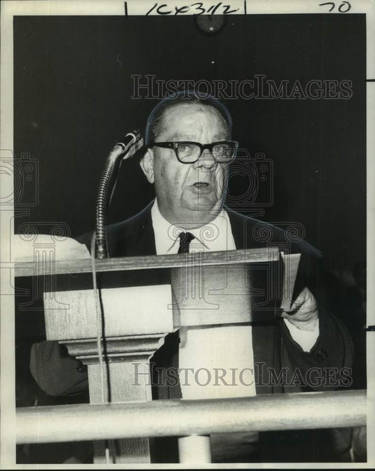 1969 Warren J. Schmidt, speaks for a small group about ordinance - Historic Images