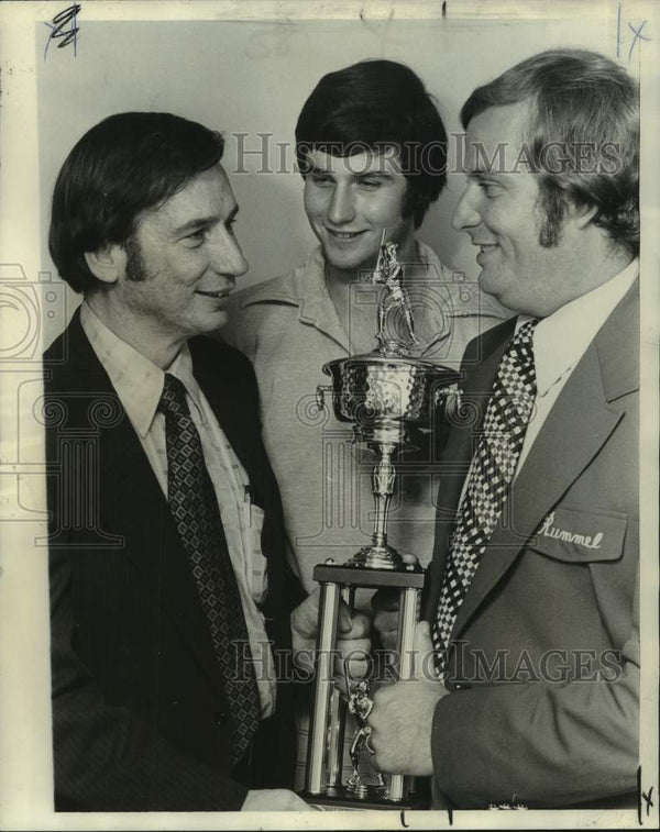 1974 Press Photo Archbishop Rummel High Attendees Admire Baseball Trop ...