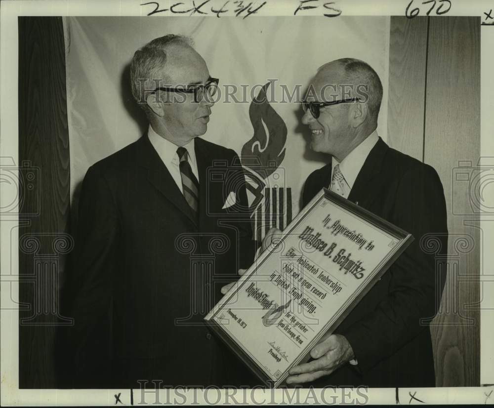 1973 Press Photo Donald Doyle presents special certificate to Wallace Schmitz - Historic Images