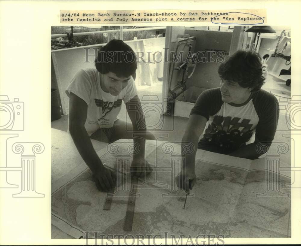 1984 John Caminita and Jody Amerson plot &quot;Sea Explorer&quot; course. - Historic Images