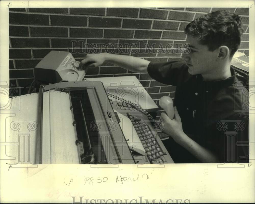 1968 Evanston Township&#39;s Glen Neuman dials regional computer help - Historic Images