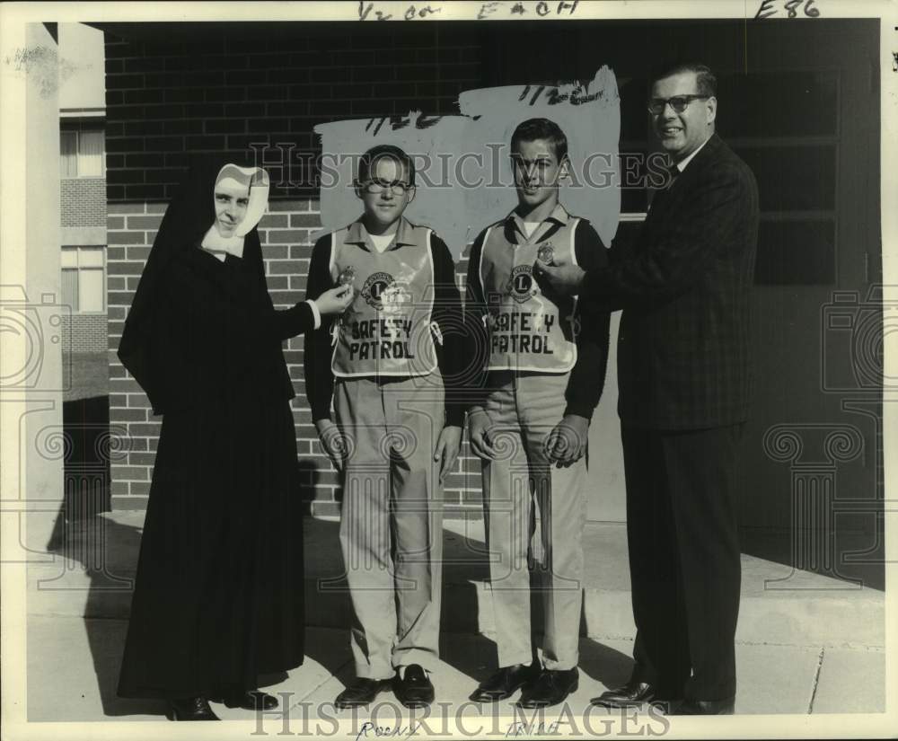 1965 David Roony and Edward Trice receive school safety gold badge - Historic Images