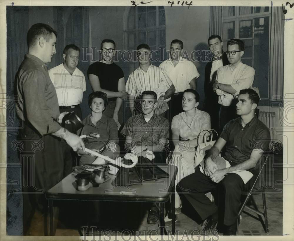 1959 Press Photo Henry Cook, scuba class instructor shows flippers &amp; snorkel- Historic Images