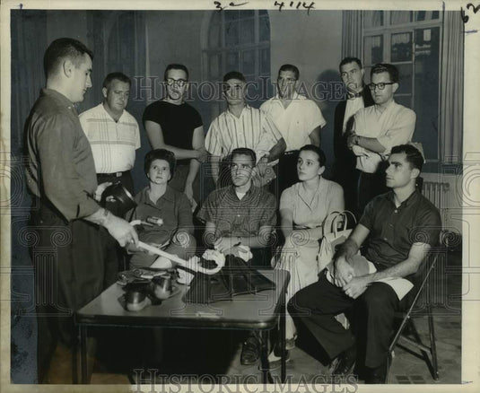 1959 Press Photo Henry Cook, scuba class instructor shows flippers & snorkel- Historic Images