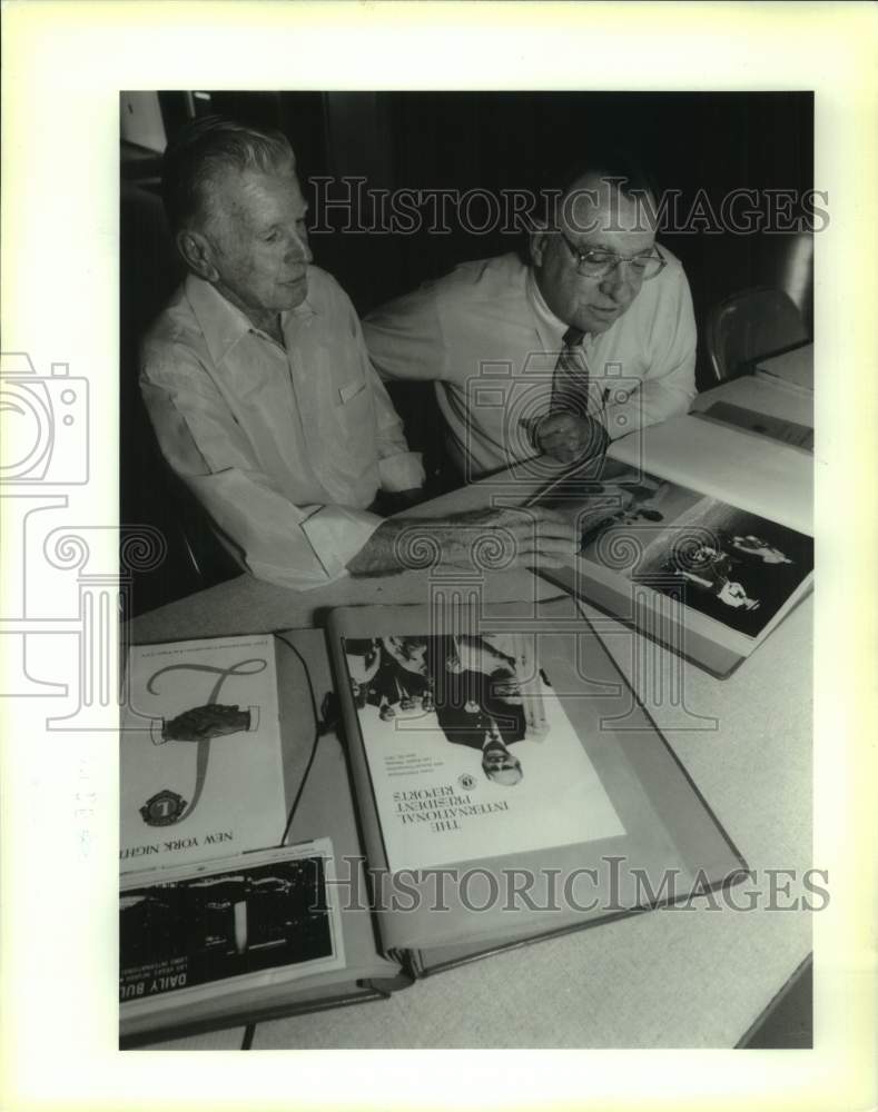 1993 Irvin Scheffler &amp; Ken Leithman look at Westbank Lions memories - Historic Images