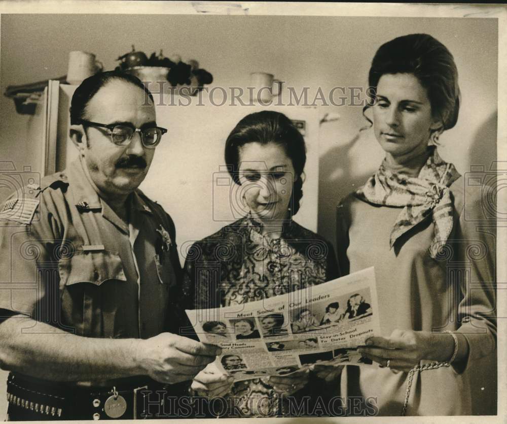 1971 Women Against Crime block party participants. - Historic Images