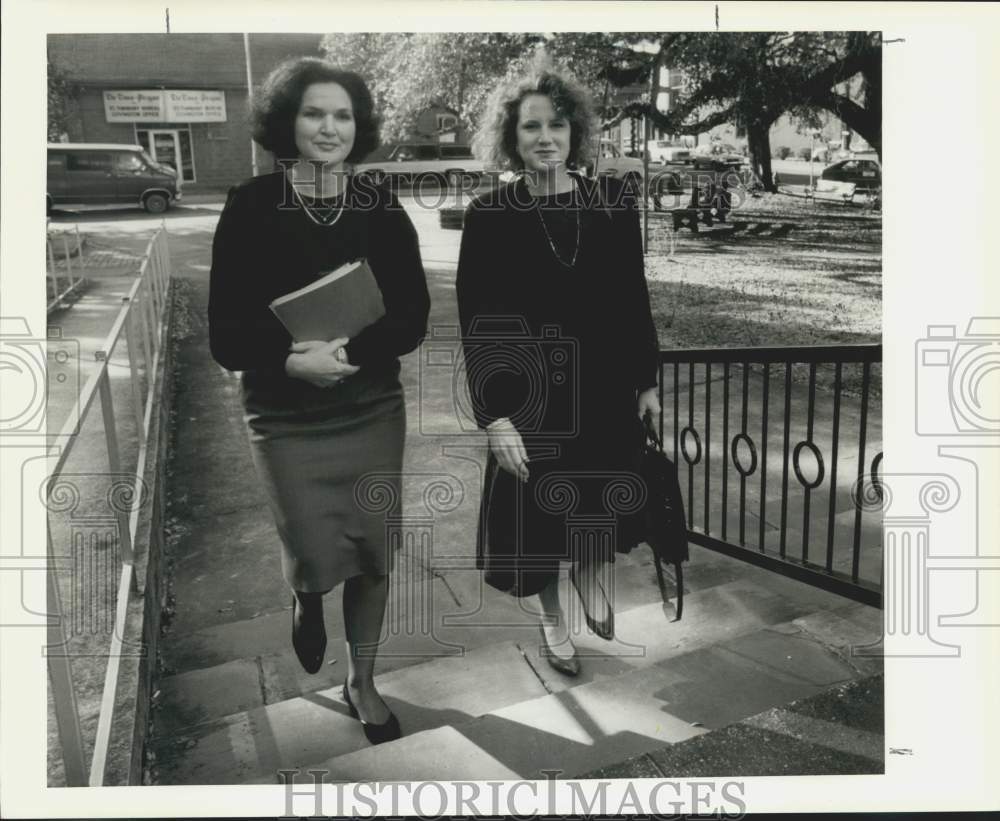 1990 Court advocates Jean Woodruff, Lorraine Favret by courthouse - Historic Images