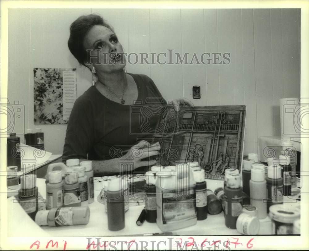 1993 Sylvia Yike explains color schemes on bas-relief - Historic Images