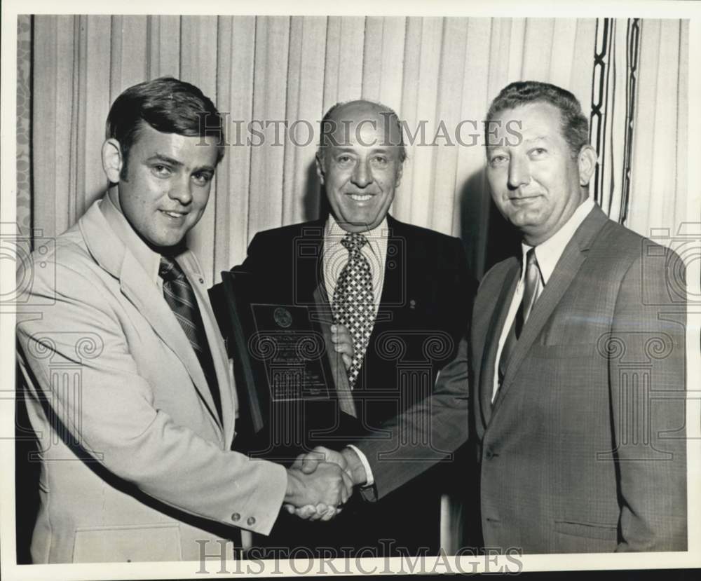 1972 Paul Yoder receives award from Vincent Arena &amp; William Bywater - Historic Images