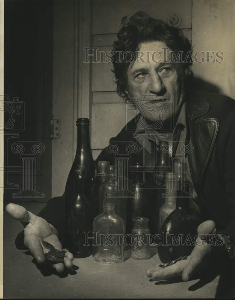 1976 Paul Verdon Sr. with Bottom Bottles - Historic Images