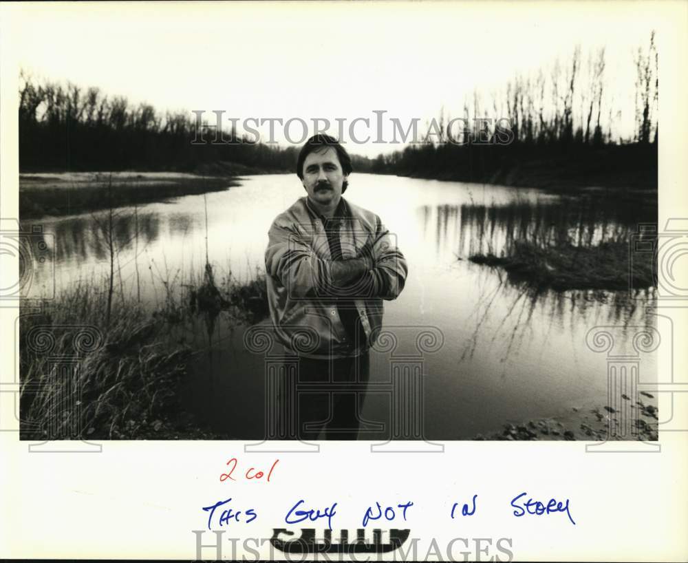 1988 Randy Walters on land between levee &amp; Stack Island in dispute - Historic Images