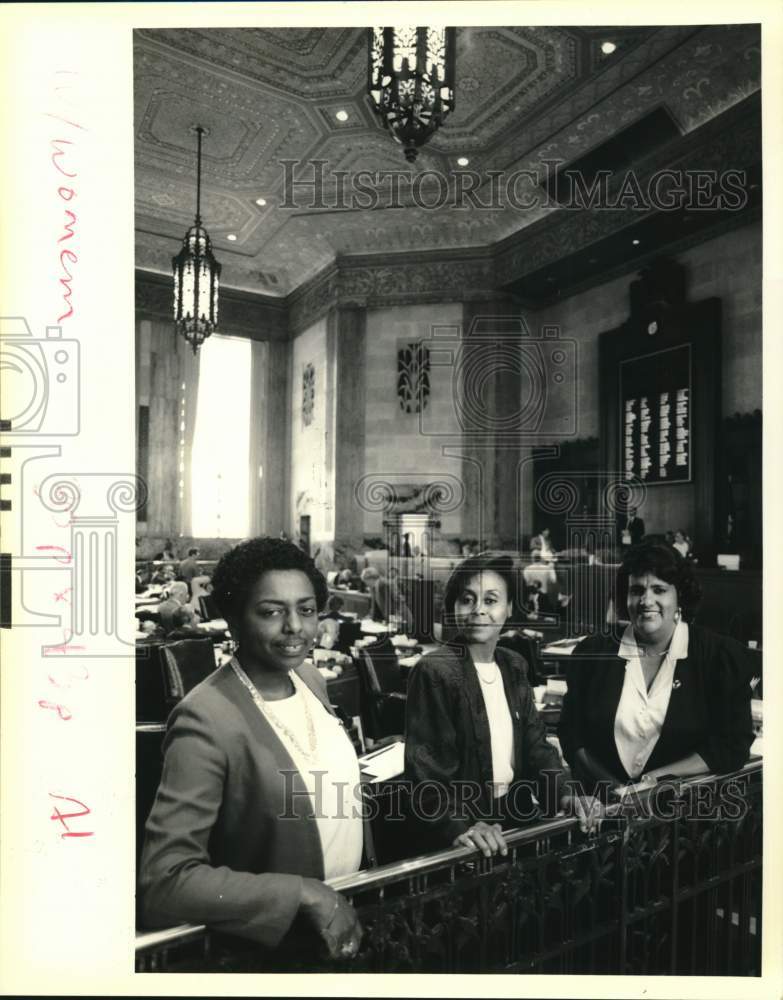 1990 Three women legislators from New Orleans on the house floor. - Historic Images