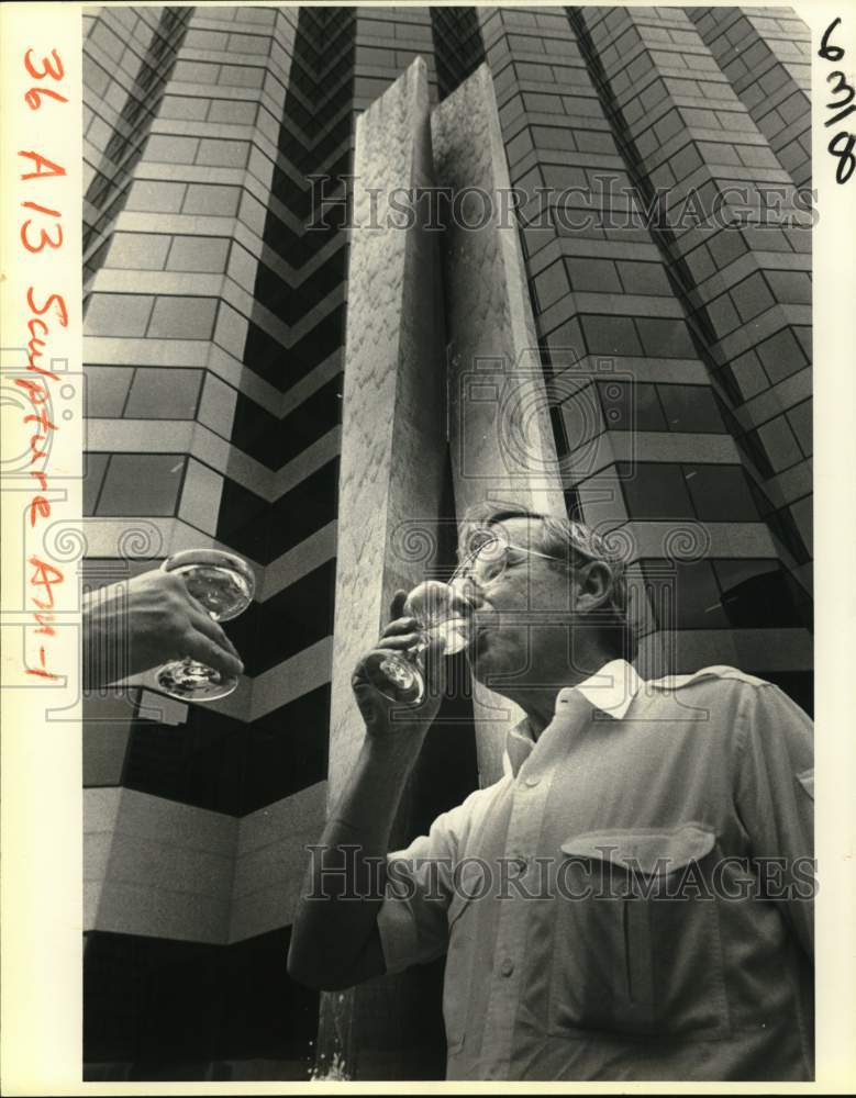 1984 Sculptor Arthur Silverman toasts unveiling 
 at Energy Centre. - Historic Images