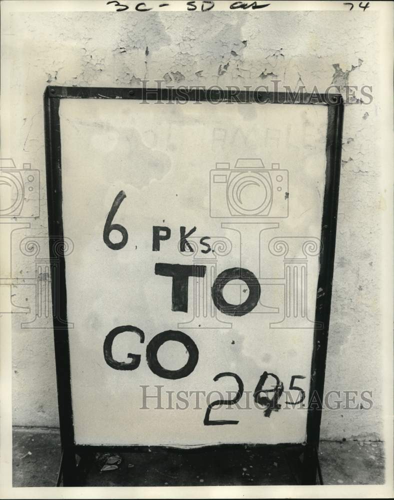 1974 Portable placard tells the rising prices - Historic Images