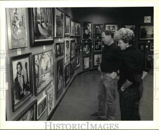 1990 Sandy Lindsay & Paul Borgatti at the Slidell Art League show. - Historic Images