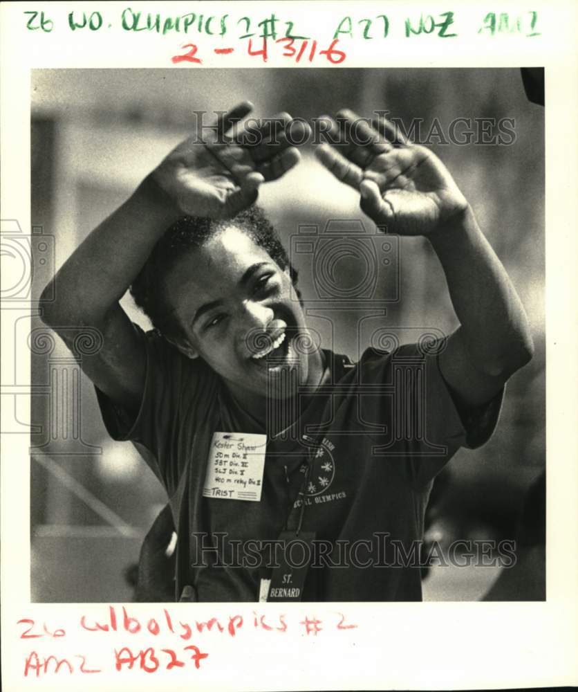 1985 Press Photo Chalmette-Kester Shaw after softball throw in Special Olympics. - Historic Images