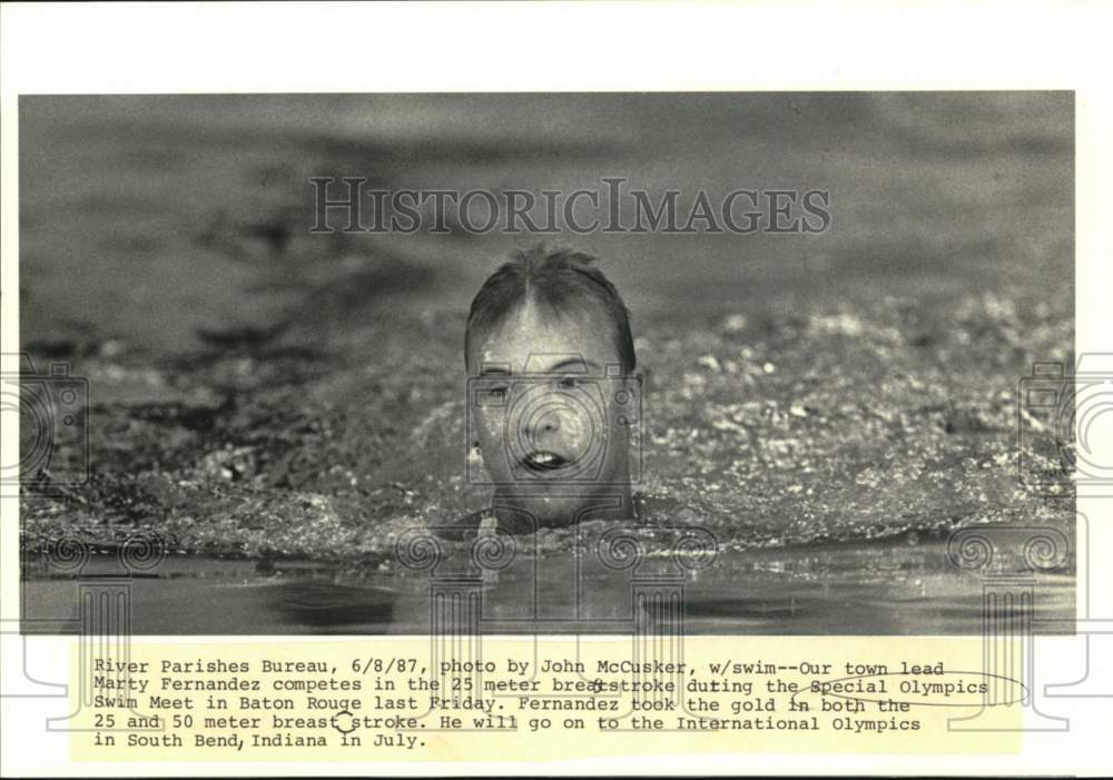 1987 Press Photo Marty Fernandez in Special Olympics Swim Meet in Baton Rouge- Historic Images