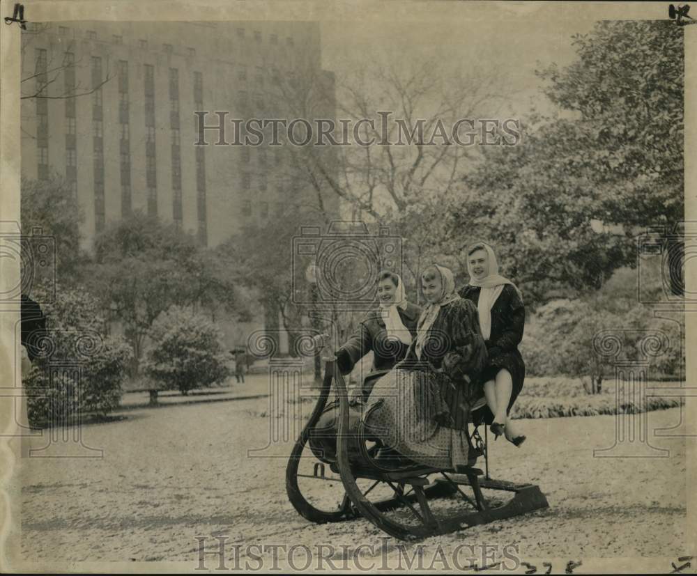 1963 An antique sled in white-blanketed Lafayette Square. - Historic Images