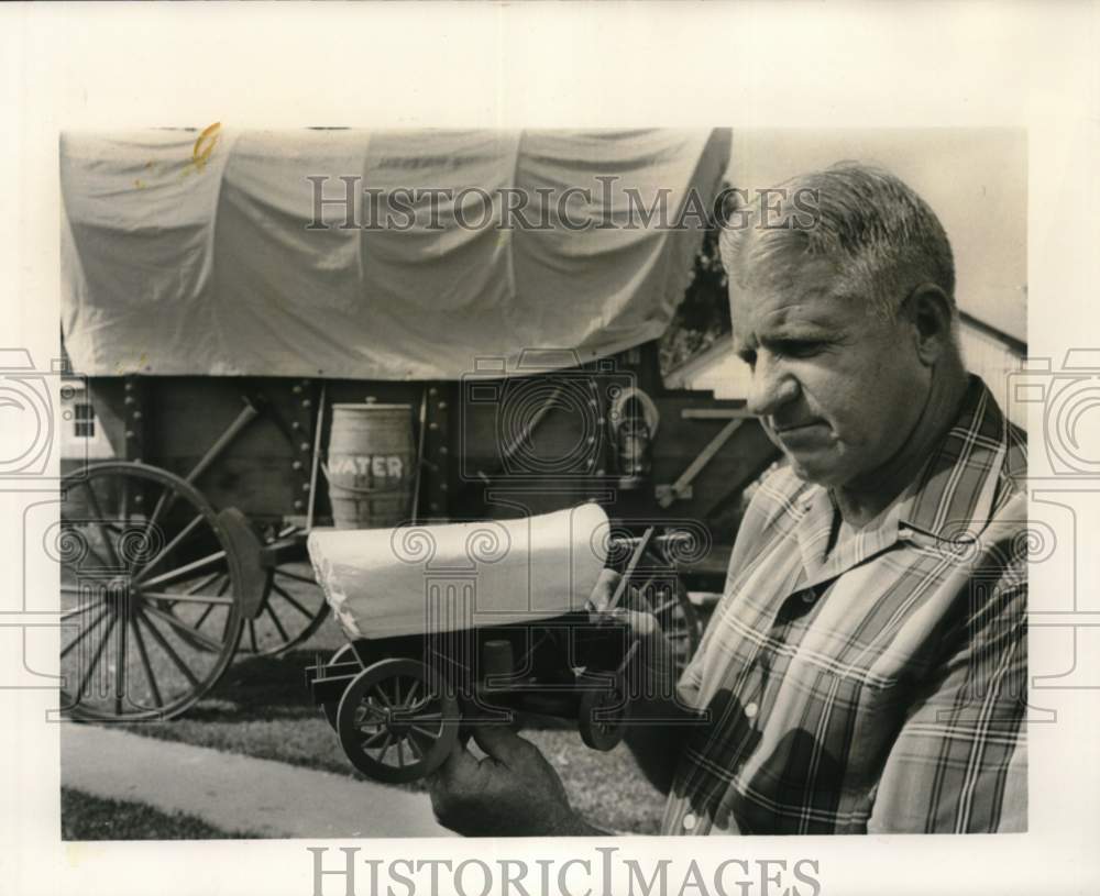 1966 Press Photo Oscar Steiner with model of wagon he built - noc67568- Historic Images