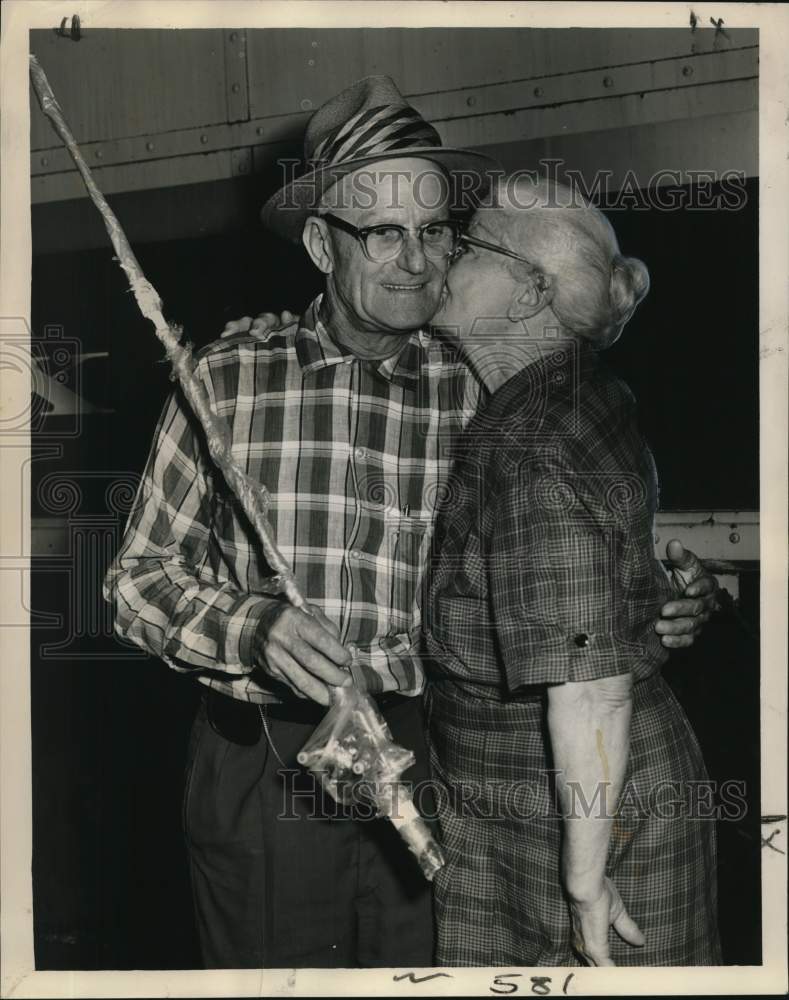 1961 Emmett Strehle kiss by sister Leona Stewart on his retirement - Historic Images