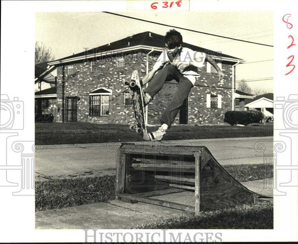 1989 Press Photo Here Ben Buisson is taking off a jump ramp on his skateboard. - Historic Images