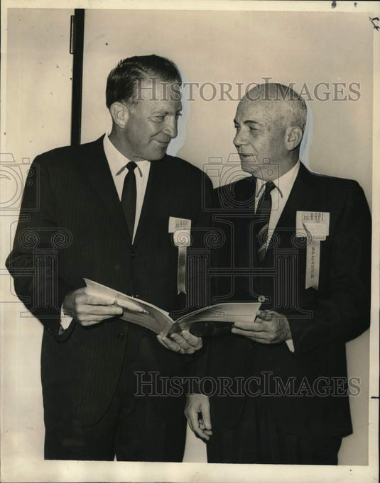 1967 William Spencer & Robert Woodul discuss Petroleum convention - Historic Images