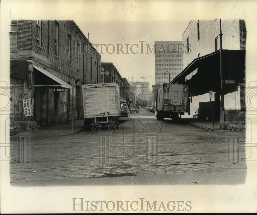 1975 Lafayette at Fulton Street as it appears today. - Historic Images