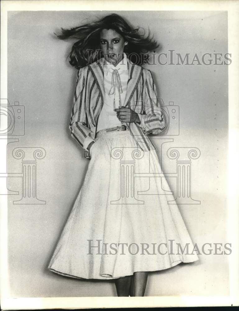 1978 A model in silk noil jacket and full skirt by Albert Capraro-Historic Images